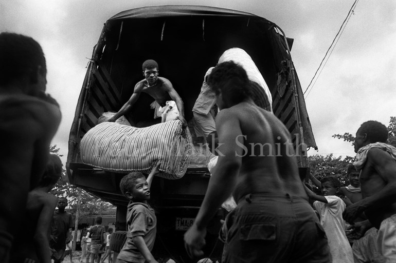 Unloading mattresses from a truck