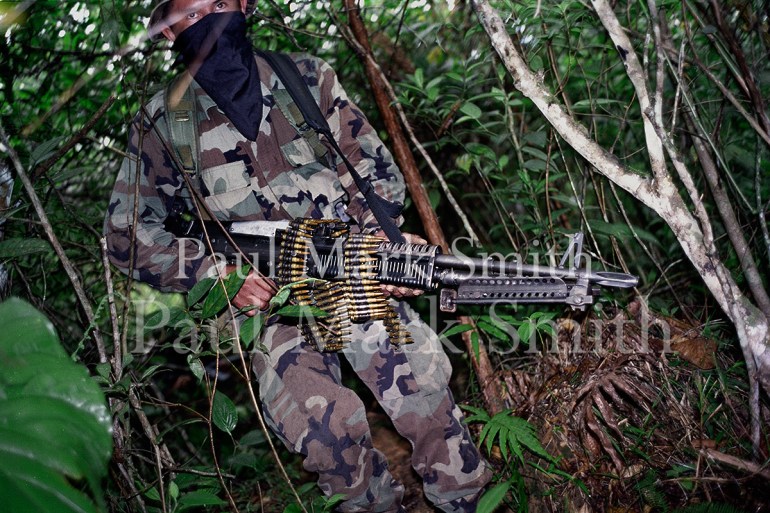 Paramilitaries of the Bloque Metro patrol countryside