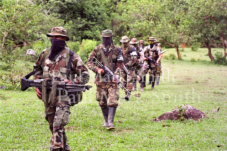 Paramilitaries of the Bloque Metro patrol countryside
