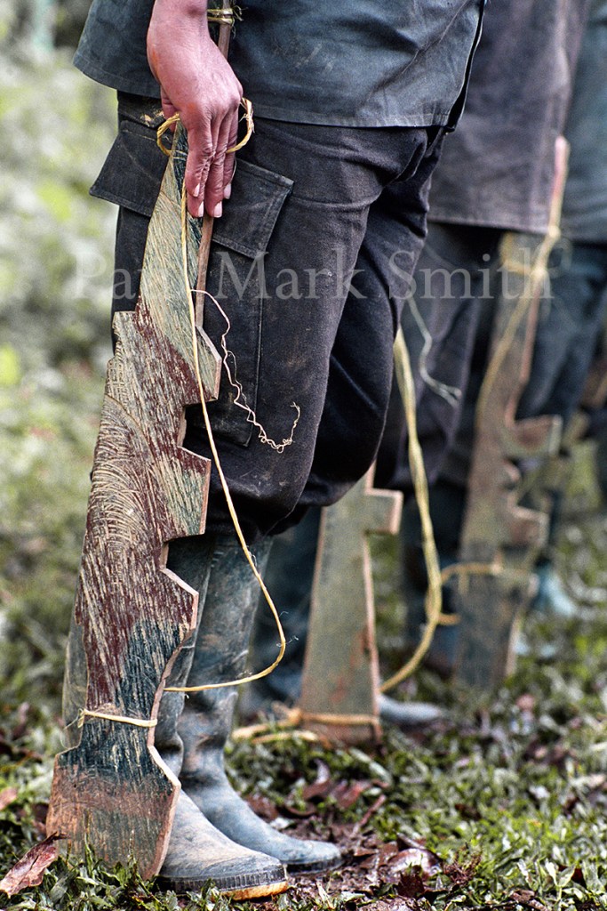 Youths train with wooden weapons in paramilitary encampment of the Metro Block
