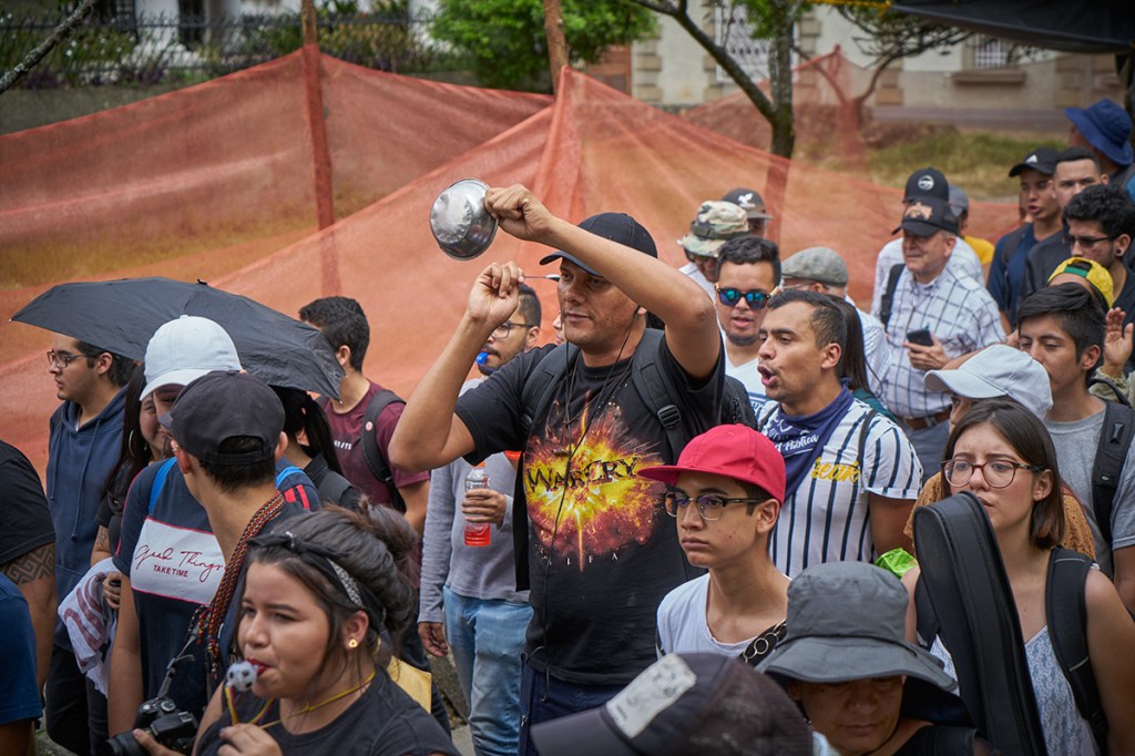 Crowds beat pans in protest