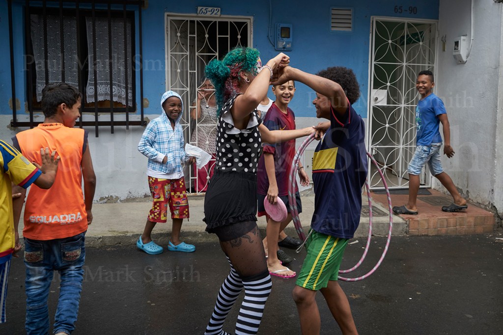 Carnivalesque dancing on the street with youths